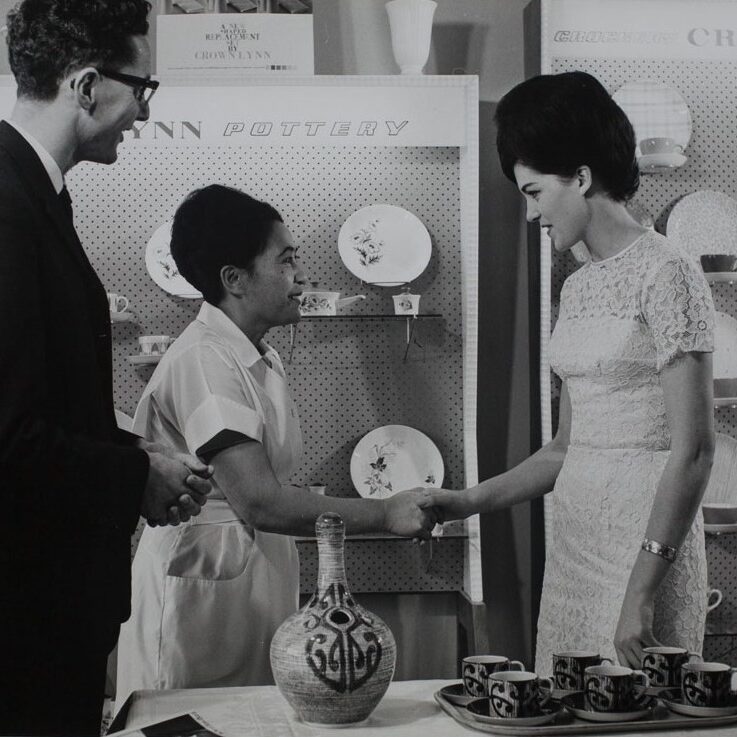 Helen Iggo being presented with ceramic gourd, 1964